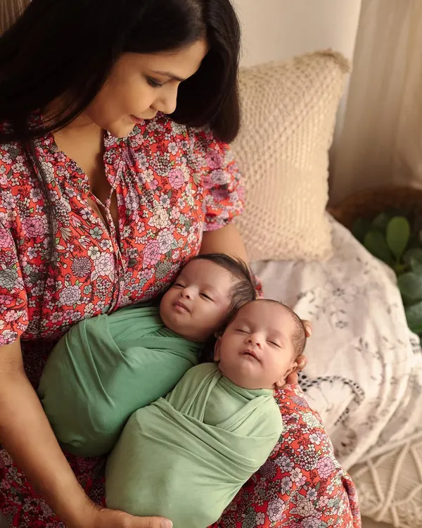 A mother holding her newborn twins for the first time is a memory to cherish. In my studio, we create a calm and gentle environment to capture these quiet, loving moments. The focus is all on you and your new babies.