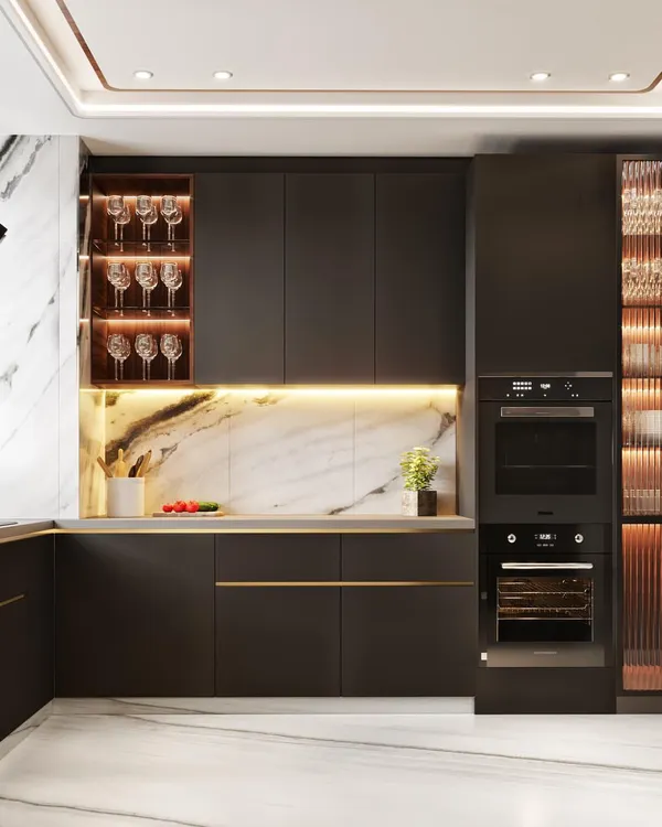 A modern kitchen render in a charcoal grey finish with gold hardware. The visualization highlights the built-in ovens, fluted glass cabinets, and the dramatic marble backsplash.