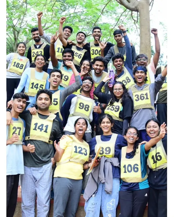 The whole team cheering after completing an obstacle course at a RYLA (Rotary Youth Leadership Awards) event. These events are all about teamwork and pushing your limits.