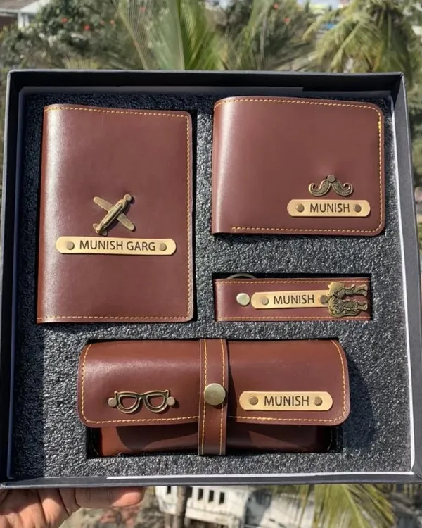 A perfect combo for him, this set includes a personalized wallet, passport cover, keychain, and eyewear case. I can engrave a name and add a charm to each item, and it comes packed in a premium gift box.