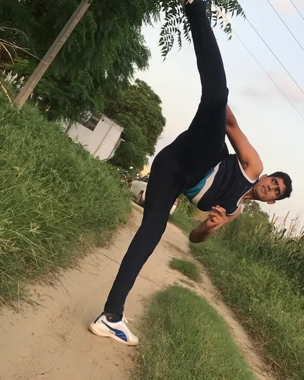 This is what dedication looks like. My training combines martial arts discipline with yoga flexibility to build real, functional power. This vertical split kick demonstrates the kind of advanced mobility and control we work towards.