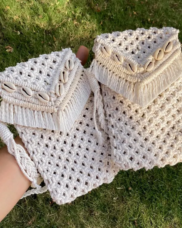 I'm so happy to share that we've sold over 200 of these mobile slings this year. They are designed to fit any phone size and come with beautiful shell details, making them a boho-chic essential.
