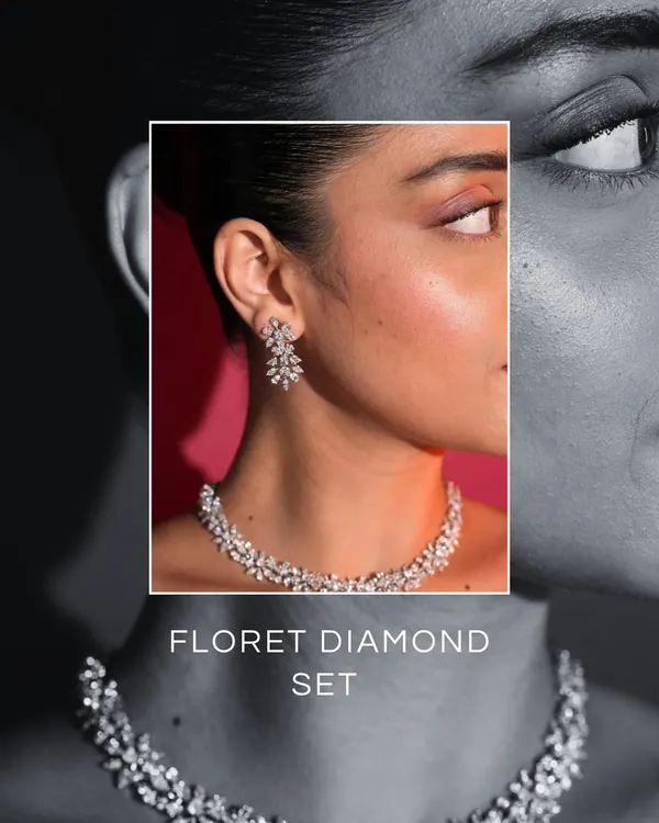 For the bride who believes in understated luxury, the Floret Diamond Set is a trousseau essential. This black and white image highlights its floral-inspired design.