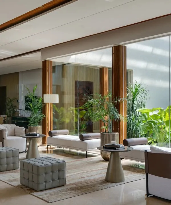 This is the heart of our Celadon project, a formal lounge that flows into an informal living space next to a sunlit courtyard. We designed this area to be visually open and functionally fluid, creating a natural rhythm for movement and interaction, perfectly embodying our belief in connecting spaces with nature.