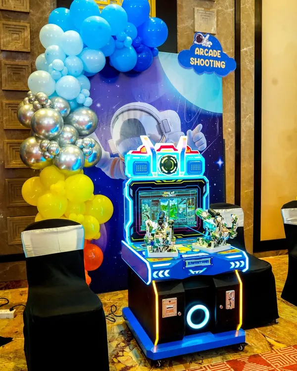 An "Arcade Shooting" game set against a space-themed backdrop, bringing the excitement of the arcade to the party.