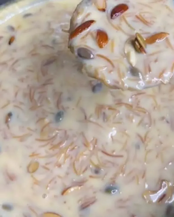 A spoonful of my creamy Simaiya Kheer. You can see the rich texture and the generous amount of nuts that I add to every serving.