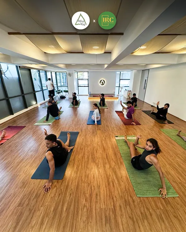 A look inside our studio during a restorative yoga session. We believe in creating a serene environment where you can focus on your practice and find your balance.