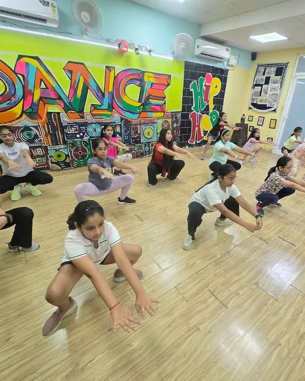 A good posture reflects a proper state of mind. Here, our students are working on their form and alignment, which is a crucial part of our dance training.