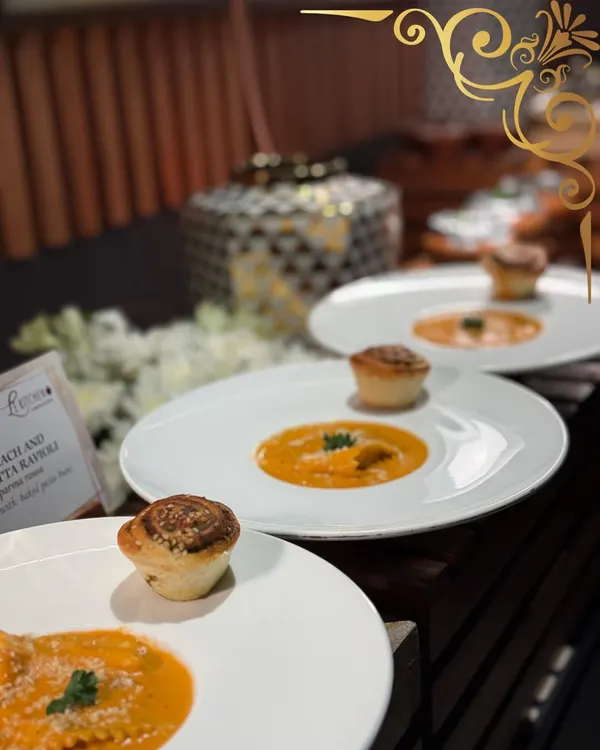 Handcrafted spinach and ricotta ravioli served in a rich tomato crema, garnished with fresh parsley and served with a savory muffin. A taste of Italy, made with love.
