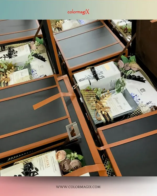 Our leather hampers are a sophisticated choice for luxury wedding gifting. This image shows a bulk order of our black and tan trunks, ready to be filled with bespoke items for a special celebration.