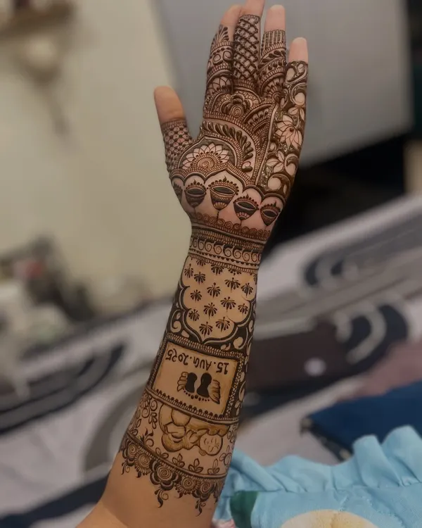 This design was personalized for an engagement. I included the couple's silhouette and their special date, "15.AUG.2025", right on the forearm.