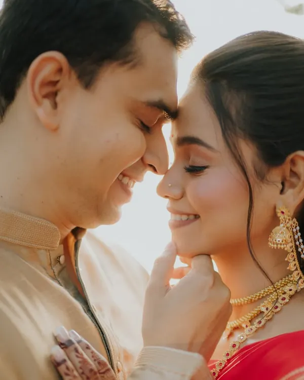 This is the kind of moment I live to capture. The soft, golden hour light, the gentle touch, and that quiet smile just before you become husband and wife. It’s pure, unposed emotion.