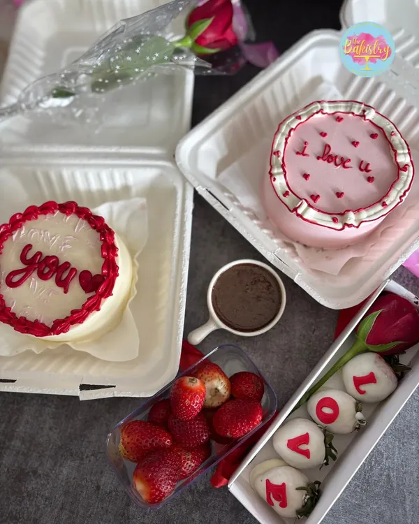 Celebrate Valentine's Day with my premium treats. This spread includes "I love you" bento cakes, chocolate-covered strawberries, and fresh roses for your special someone.