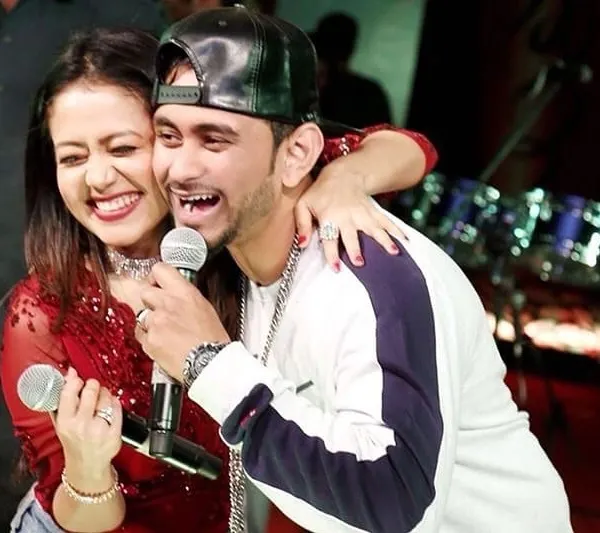 Sharing a laugh on stage with the incredible Neha Kakkar. As a live concert host, my goal is to create these moments of genuine connection between the artist and the audience, making the show unforgettable.