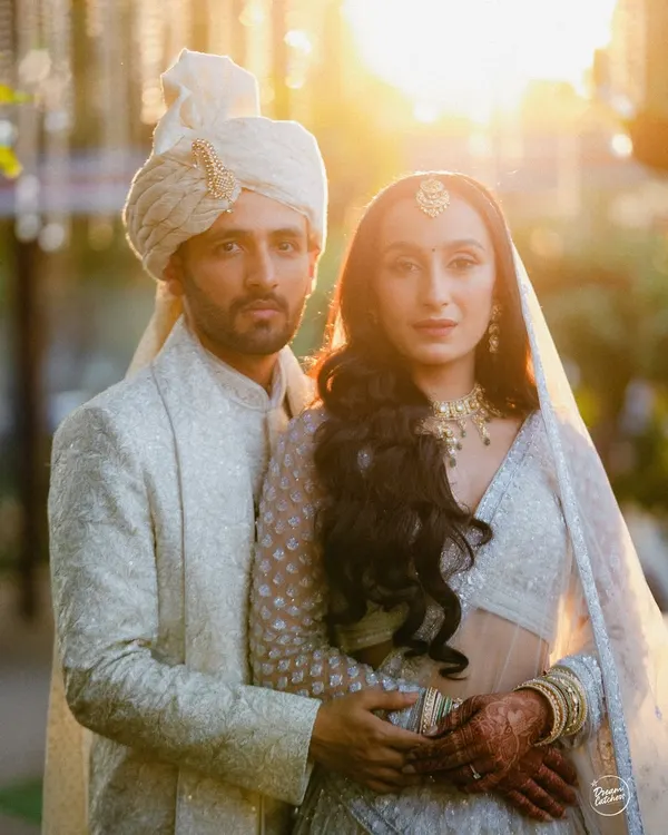 A stunning golden hour portrait of the bride and groom. This is the kind of light and emotion that makes wedding photography so magical.