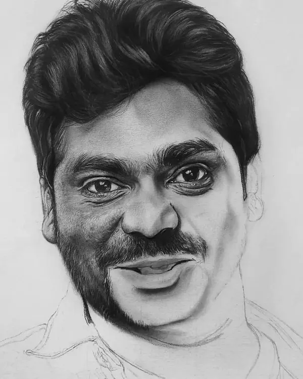 A work-in-progress shot of a realistic portrait of Zakir Khan. You can see how I build up the skin texture and features on one side while the other side is still a basic line drawing.