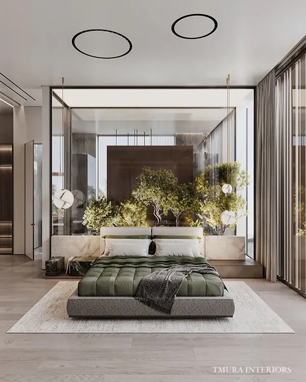 This master bedroom is designed as a personal oasis, seamlessly integrating nature through a glass-enclosed garden. We focused on creating a tranquil retreat with a serene color palette, abundant natural light, and custom furnishings that speak to a lifestyle of quiet luxury.