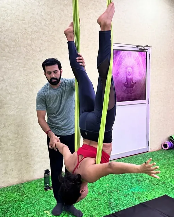 You are always supported here. I provide hands-on guidance, especially for beginners, to ensure you feel safe and confident as you learn to trust the hammock and explore new movements like this supported inversion.