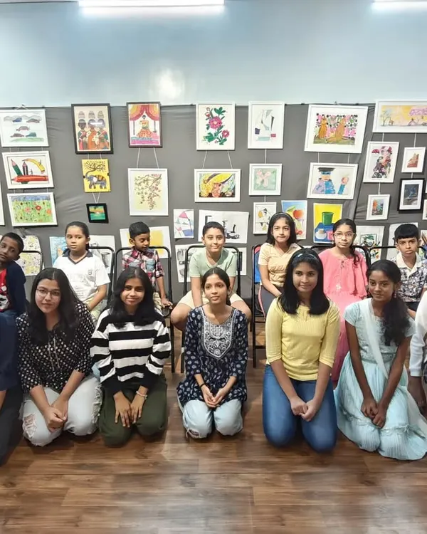 I am so proud to present our talented students at our annual art exhibition and prize distribution program. It's a joy to see them stand beside their creations, which are displayed for all our friends and family to appreciate.