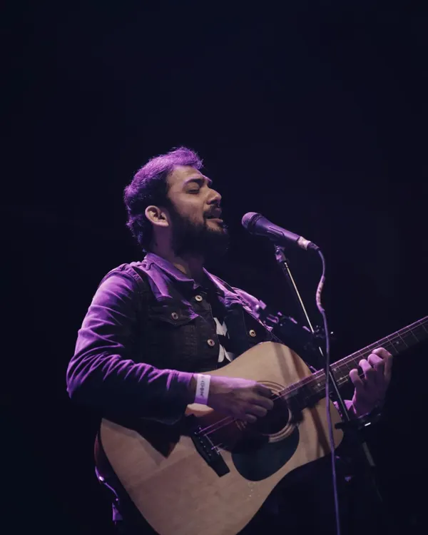 A surreal experience performing my original songs at Fandom. This photo captures the feeling of sharing my own music with a live audience, a moment of pure connection.