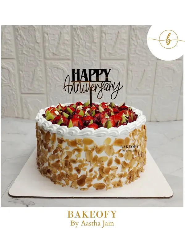 My Premium Fresh Fruit Cake is for those who love a light, fresh, and beautiful dessert. I use a soft vanilla sponge, fresh whipped cream, and top it with a vibrant mix of seasonal fruits and crunchy toasted almonds.