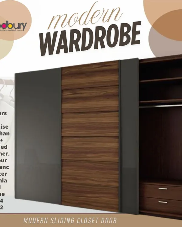 Sliding door wardrobes are a perfect solution for rooms where space is tight, as they don't require room to swing open. This design combines a dark grey finish with a textured wood panel, creating a sophisticated and modern look.