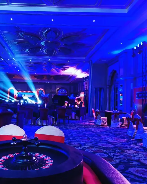 We transformed this corporate hall into a high-energy casino night for a truly unforgettable Diwali party. The setup includes professional lighting and multiple game tables to create an authentic and exciting atmosphere for all the guests.