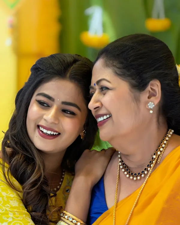 A beautiful, candid moment between actresses Inchara and Mansi Joshi during a Haldi-themed shoot. I created fresh, glowing makeup for both.