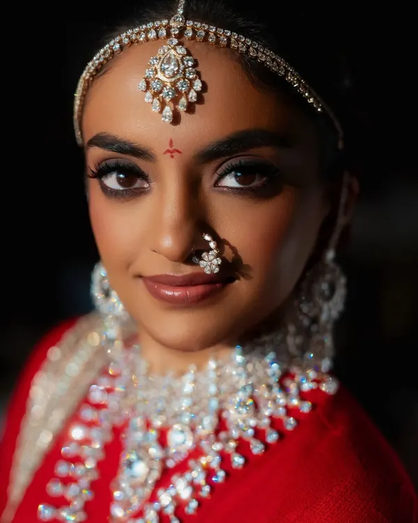 A stunning bride glowing on her wedding day. My goal is to create this kind of healthy, luminous skin that makes makeup look flawless and lets your confidence shine.