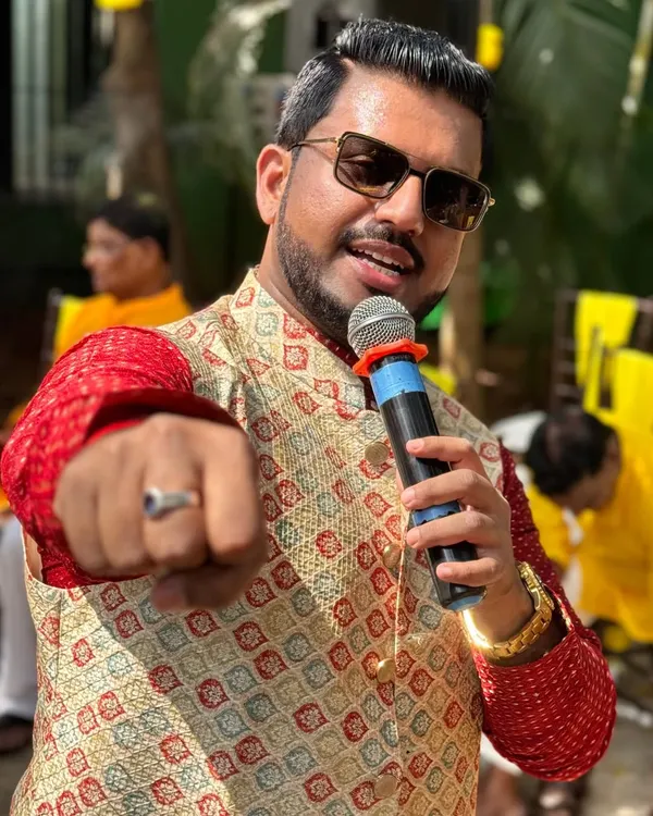 My signature pose. Microphone in hand, ready to spread happiness and get the party started.