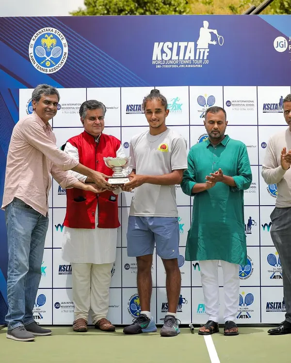 Sehaj receiving his singles winner trophy at the prestigious KSLTA ITF World Junior Tour. This is a significant step in his journey on the international tennis circuit, reflecting the high caliber of our training.