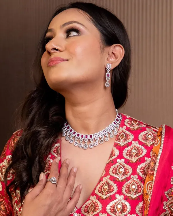 A close-up of a beautiful diamond and ruby style necklace set. Renting jewellery is a smart way to perfectly match your accessories to your outfit for every single function.