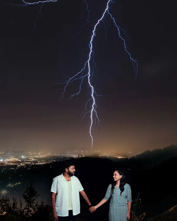 A truly electric moment. We captured this incredible pre-wedding shot with a real lightning strike, showing our dedication to creating one-of-a-kind images.
