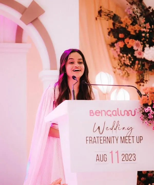 A candid moment of joy while hosting the Bengaluru Wedding Fraternity Meet Up. It's a special feeling to be the voice of an event that brings together the best in the wedding industry.