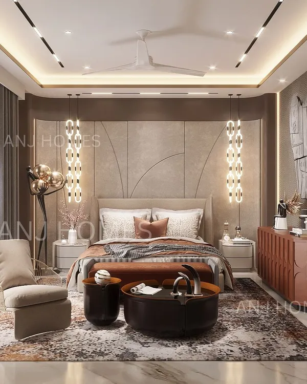 A glimpse into a master bedroom where comfort meets high design. We used a palette of warm, neutral tones, accented with rich textures and statement pendant lighting. The custom headboard and curated furniture pieces come together to create a space that feels both sophisticated and deeply inviting.