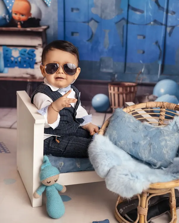 This little boss baby is ready to take over the world, one adorable pose at a time. The sunglasses and confident attitude made this themed shoot so much fun to capture.