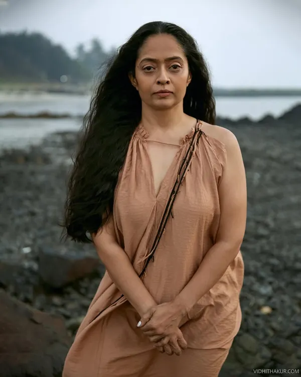 This is what I love about outdoor portrait sessions. We went to the beach during the golden hour, and the natural light allowed us to capture this raw, powerful moment of quiet strength. It’s about finding that connection with yourself and the environment.
