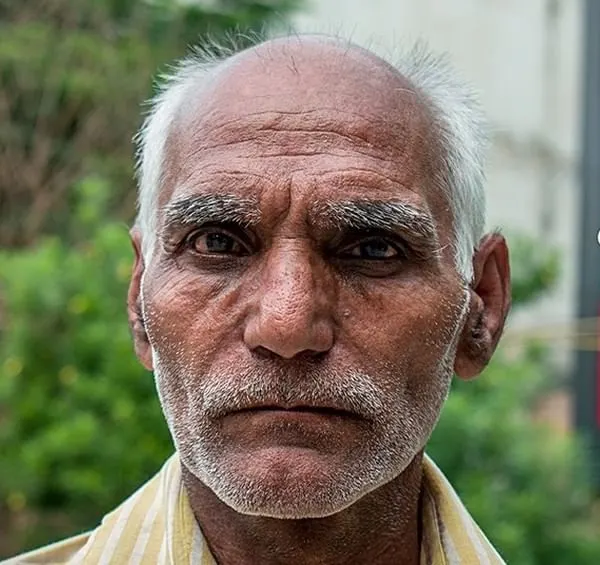 I met this gentleman on the street and was drawn to his intense, thoughtful expression. His face shows a life of experience, and I wanted to capture that character in a direct, honest portrait.