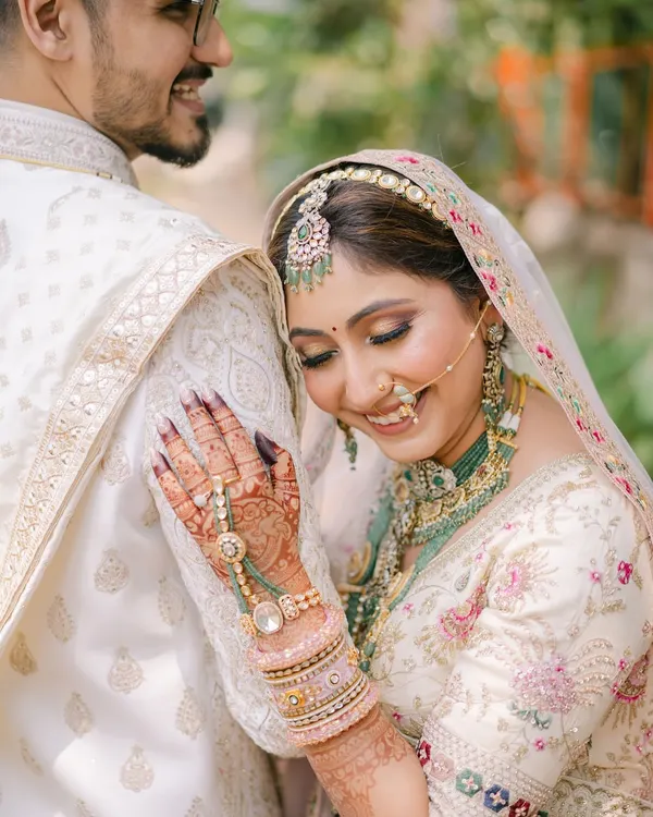 This is what it's all about: pure happiness. I create looks that not only look beautiful in photos but also let you feel completely yourself on your big day. This bride's radiant smile in her soft, elegant makeup says it all.