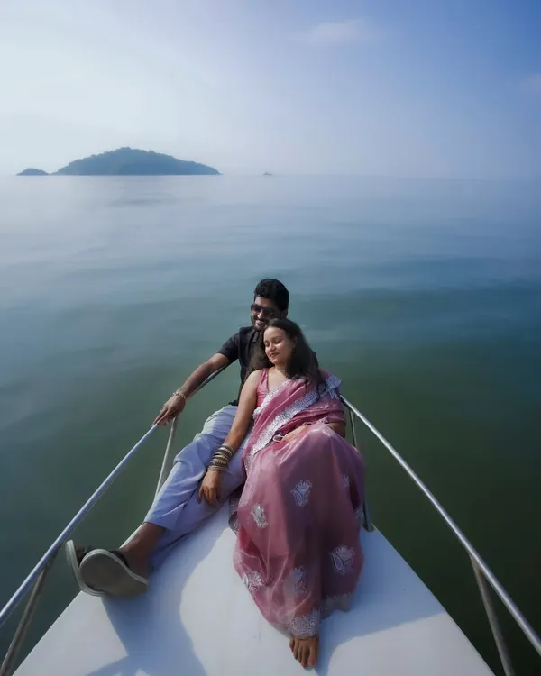 An intimate moment on a private boat near Cintacor Island. Destination shoots allow for unique experiences like this, capturing your love story with the endless ocean as your witness.