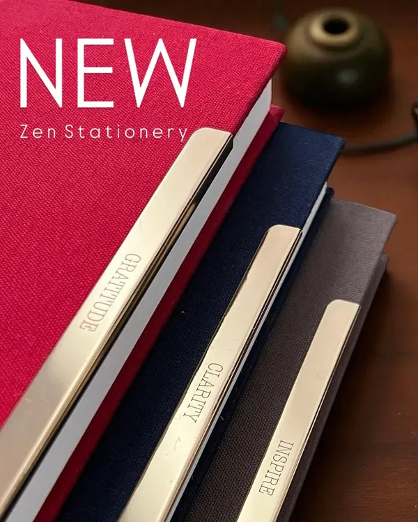 Our new Colton Notebooks are made for mindful moments. They feature pure cotton covers, handmade paper, and a golden brass clip etched with words like 'Gratitude', 'Clarity', and 'Inspire' to ground your day.