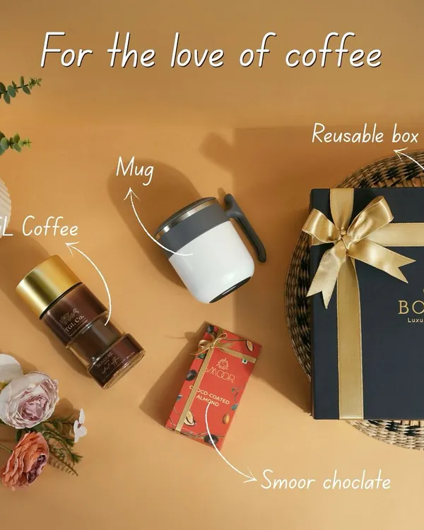For the love of coffee. This hamper is curated for coffee connoisseurs, featuring TGL coffee, a stylish mug, and Smoor chocolate, all in a reusable luxury box.