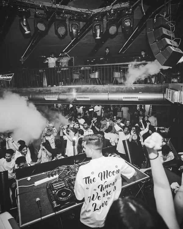 A black and white shot from above the crowd at FLO Church Street, with CO2 cannons blasting. This is the Craftyverse, where the energy is always at maximum.