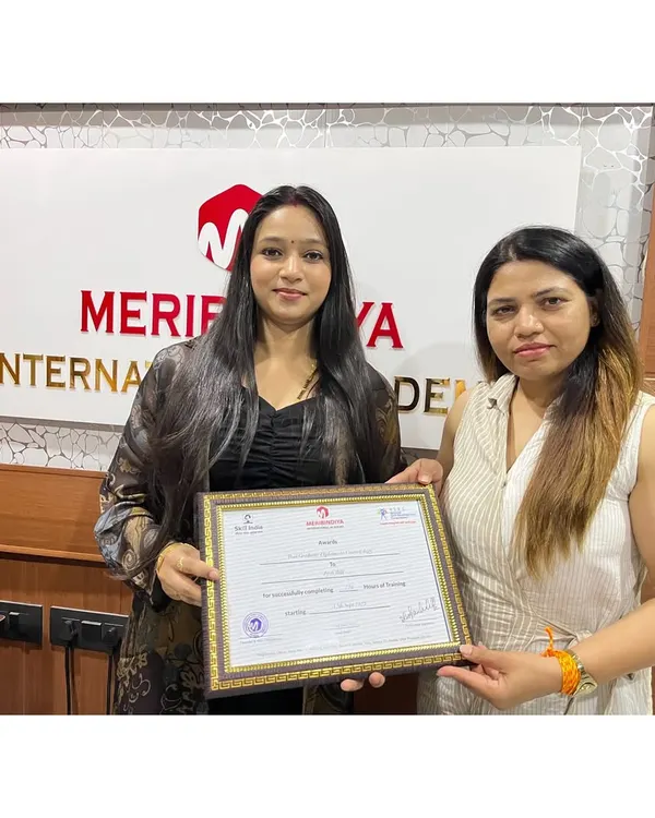 Another proud graduate receives her certificate. I am so excited to see the amazing career she will build with the skills learned at my academy.