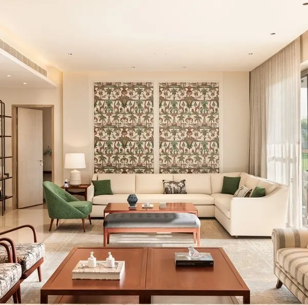 Welcome to our world of design, where every space is crafted to be a sanctuary. This living area from our Max128 project in Noida opens onto a lush deck, embodying our philosophy of blurring the lines between inside and out. We believe a home should be a place to slow down and reconnect, using clean lines, natural light, and a blend of contemporary and Indian design elements to create a feeling of calm.
