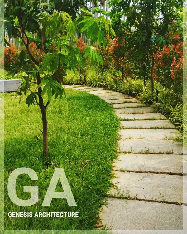 A simple garden path made from natural stone slabs, set into a lush lawn. This detail from a farmland project shows our belief that the journey through a garden should be as beautiful as the destination.