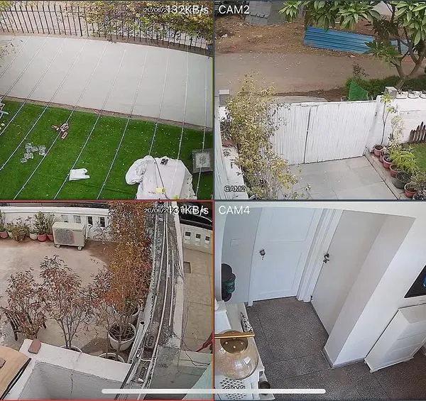 This is a four-camera view from a CP Plus HD system I installed at a home in DLF Phase-I, Gurgaon. It covers the front lawn, driveway, back patio, and an interior hallway, ensuring all key areas of the property are monitored.