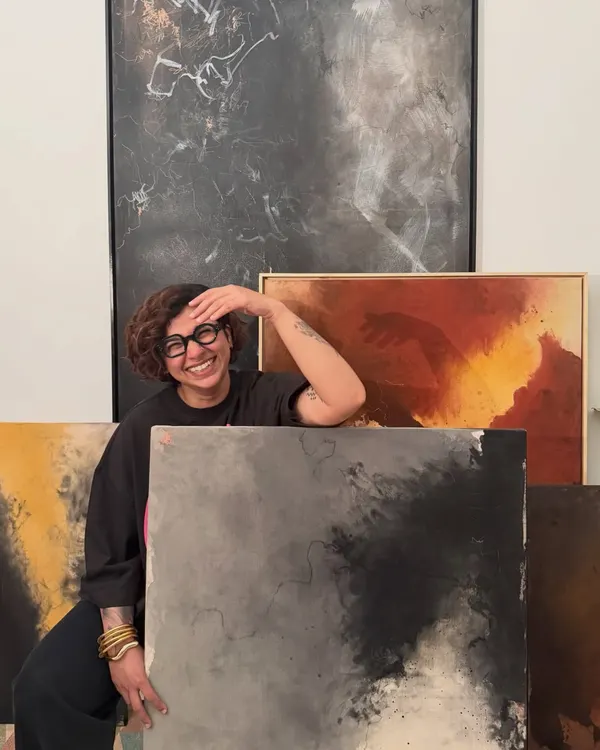 I've been a calligrapher for years, but recently, art started taking the lead. This photo was taken as I was transitioning my work and my website to reflect where I am now. It's me, surrounded by my new direction.