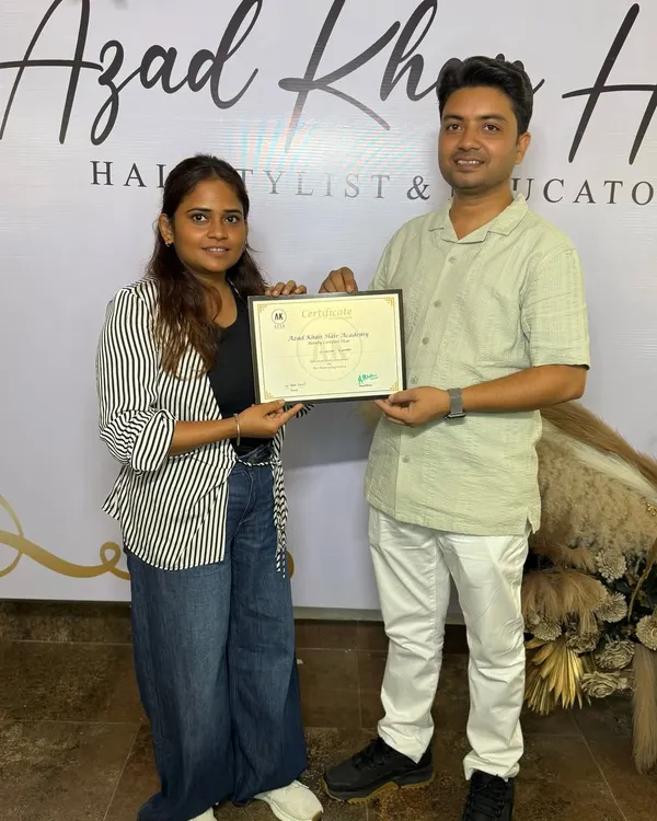 Another successful student receiving her certificate of completion. I am confident in her skills to create beautiful hairstyles for her clients.