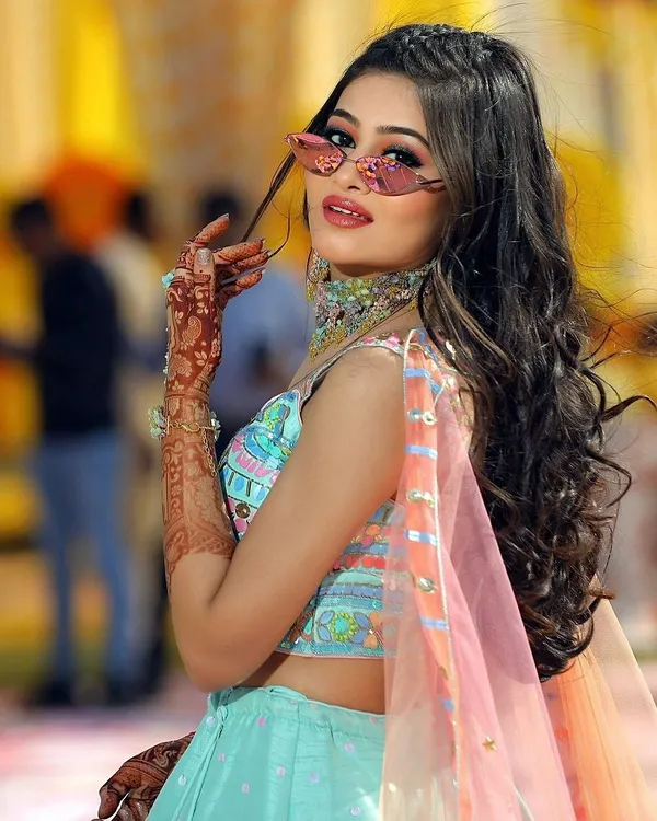 This is the energy I love to create for your special days. A happy client looking absolutely radiant at her Haldi ceremony, wearing a vibrant, custom-matched choker set that brings her whole look to life.